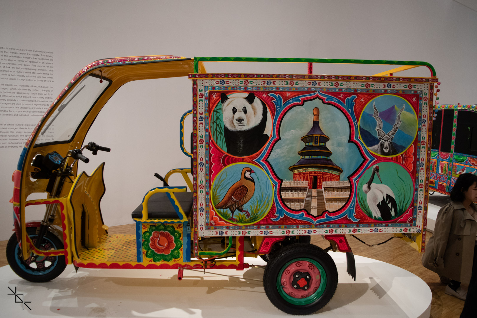 Auto rickshaw with truck art.